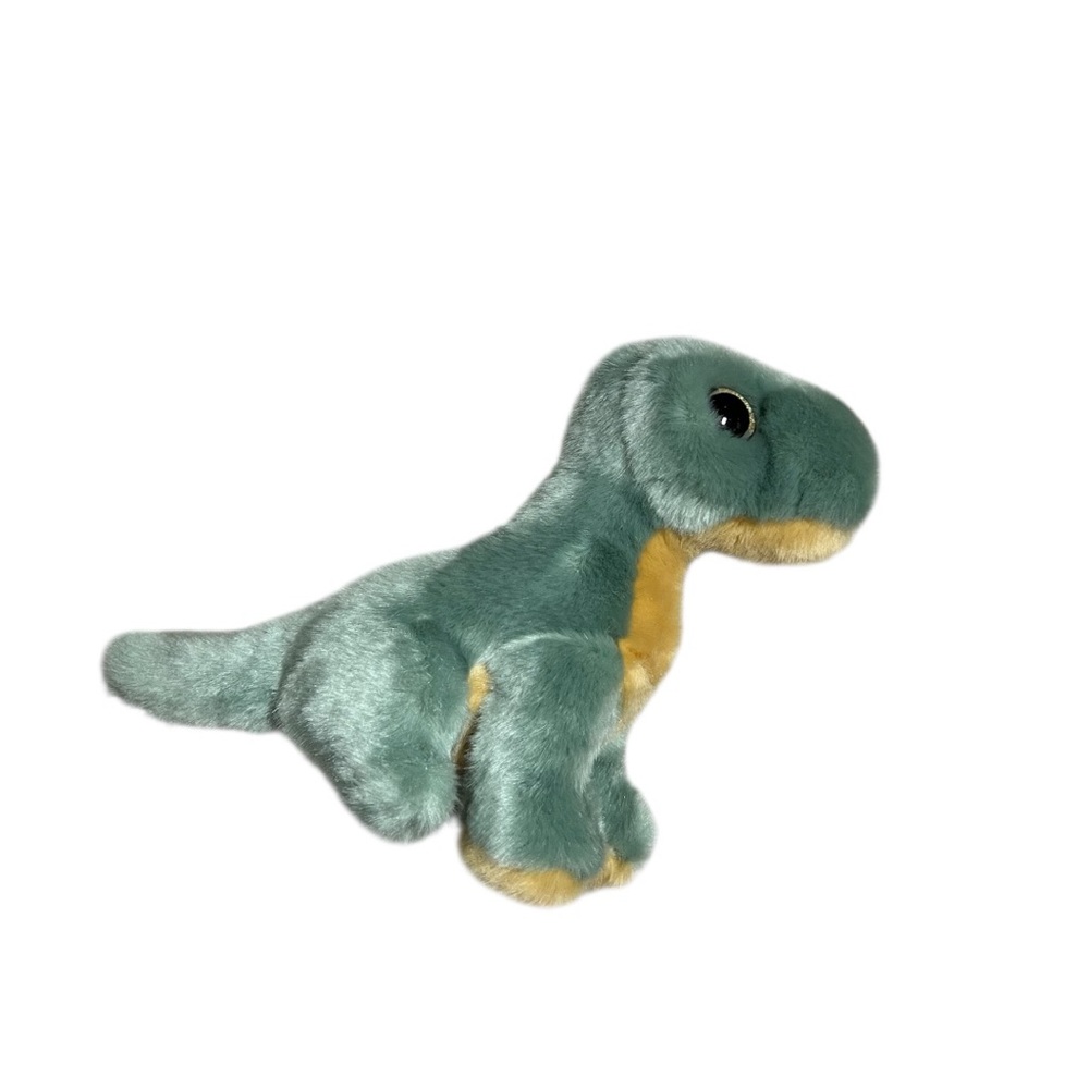 🦖ADVENTURE PLANET: Small greenish & tan stuffed toy dinosaur.